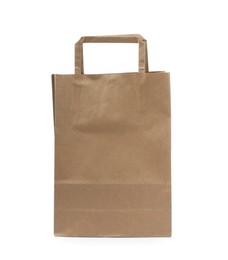 Photo of Kraft shopping paper bag isolated on white