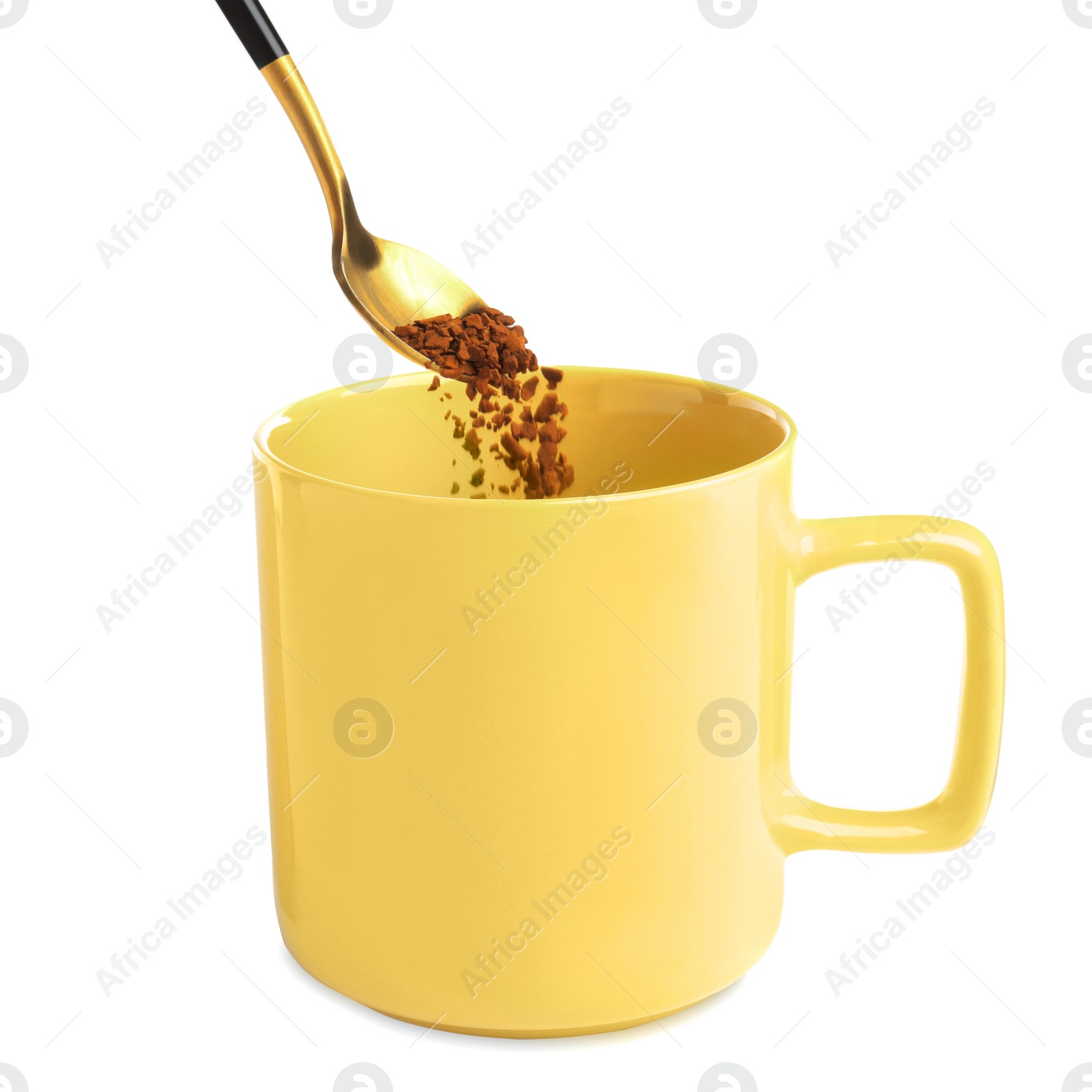 Photo of Pouring aromatic instant coffee into cup on white background