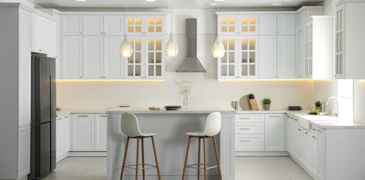 Beautiful kitchen interior with new stylish furniture. Banner design