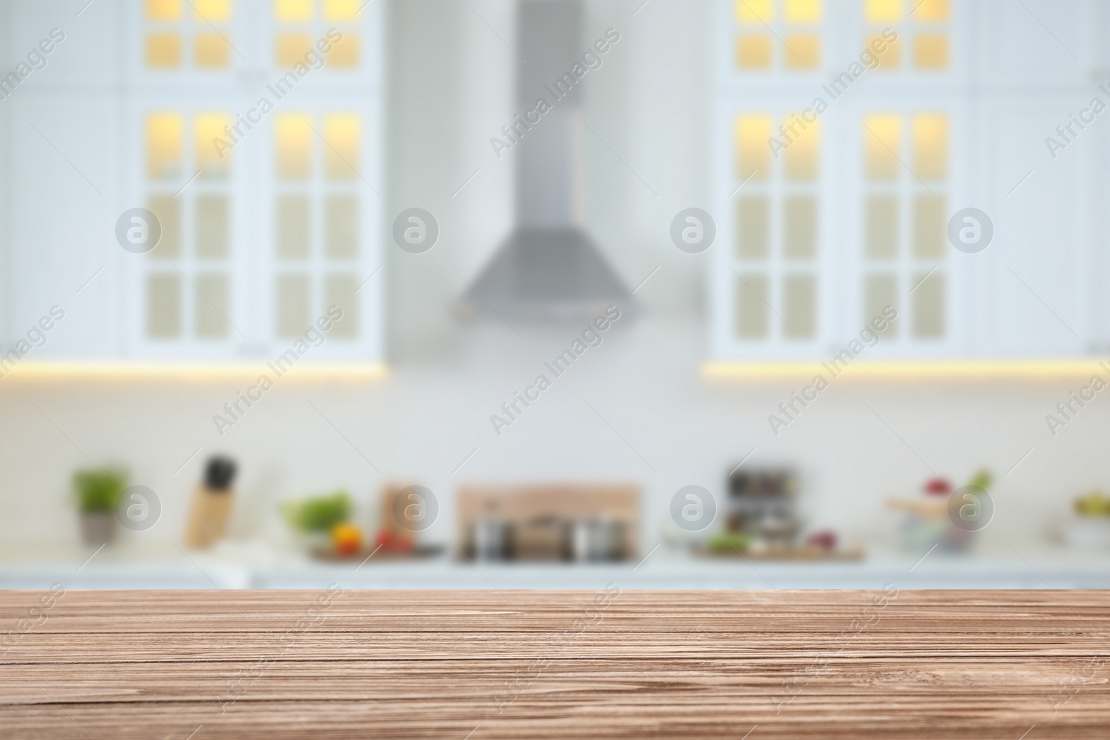 Image of Empty wooden table and blurred view of stylish kitchen interior. Mockup for design