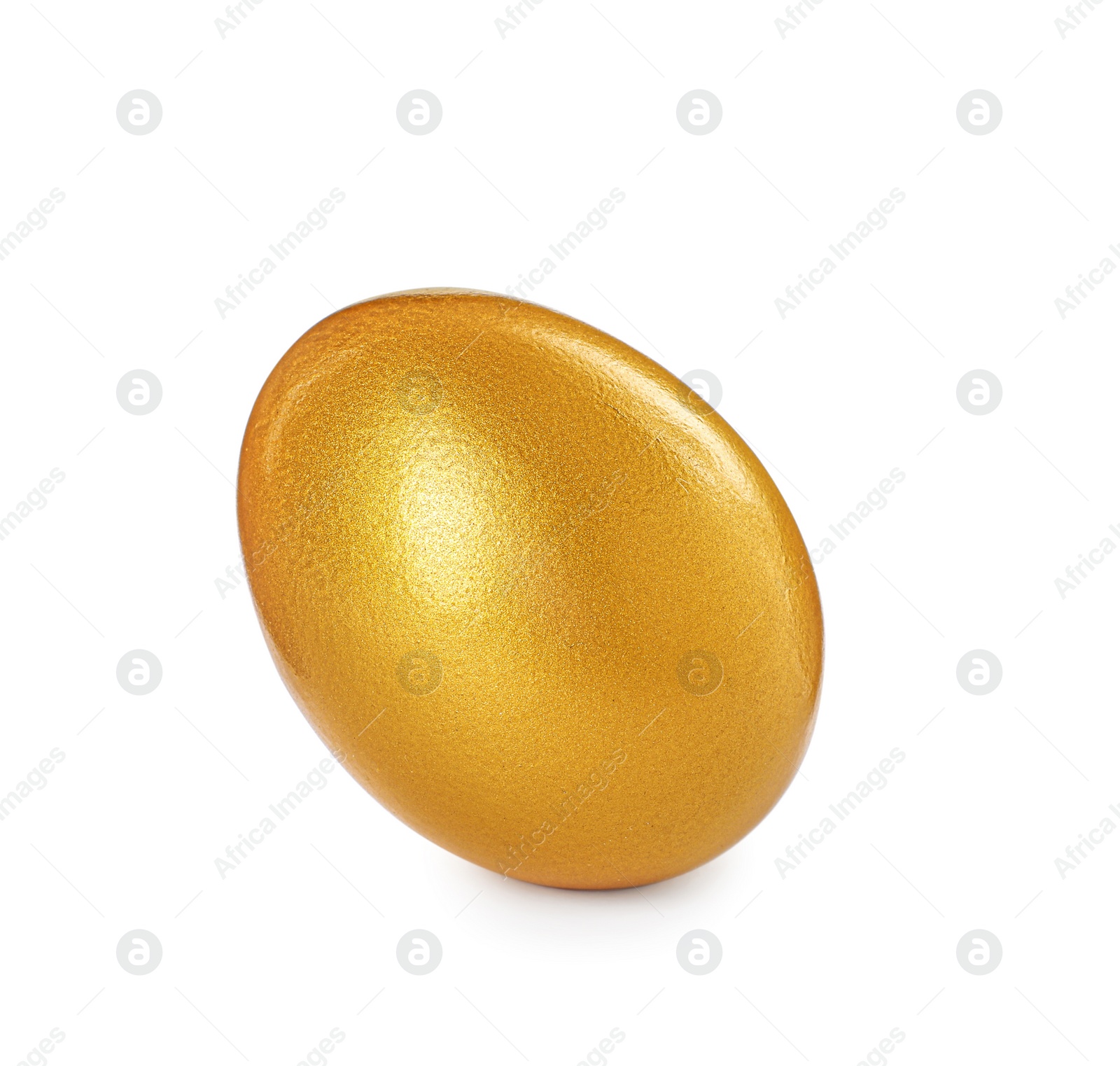 Photo of One shiny golden egg isolated on white