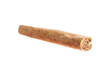 Photo of One aromatic cinnamon stick isolated on white