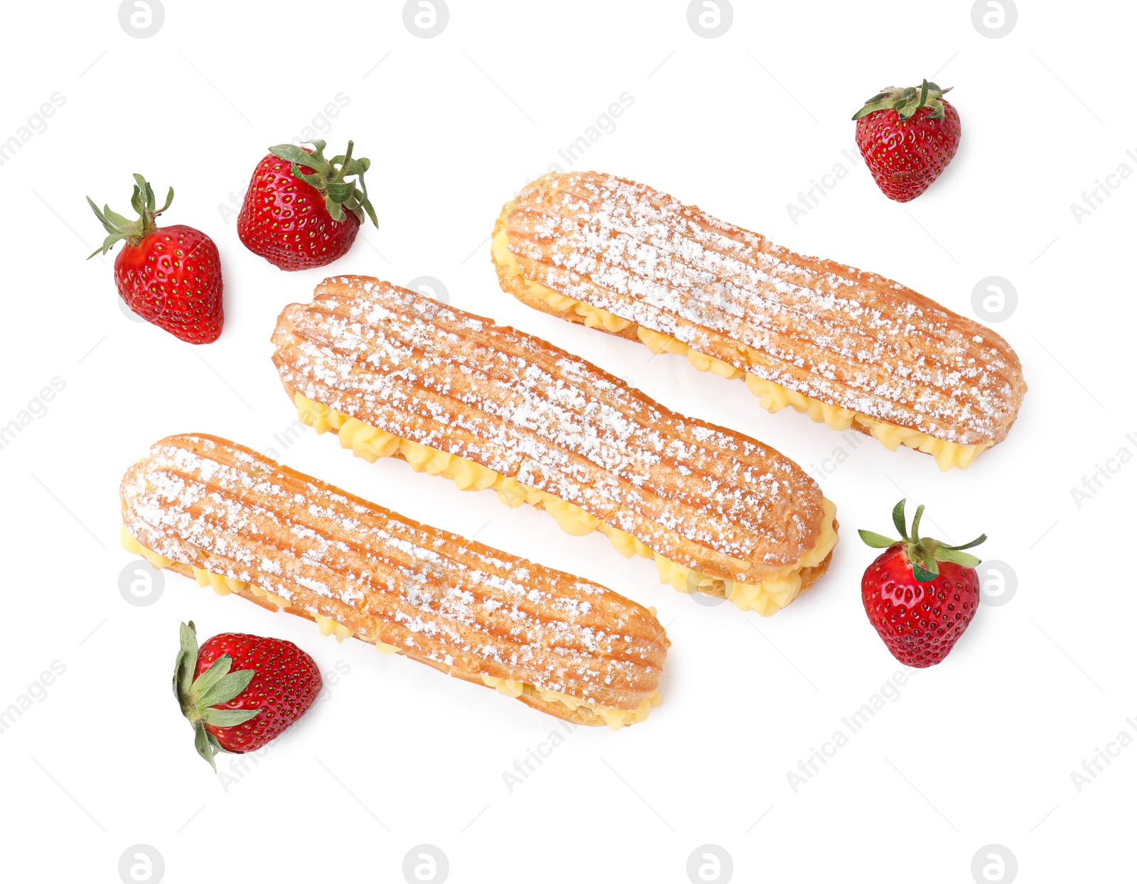 Photo of Delicious eclairs filled with cream and strawberries isolated on white, top view