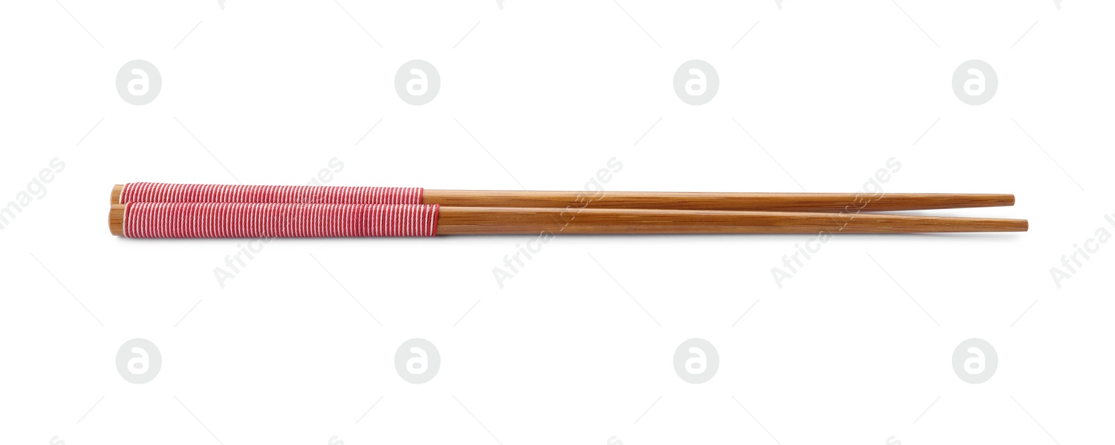 Photo of Pair of wooden chopsticks isolated on white