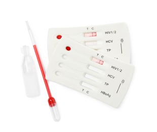 Photo of Disposable express hepatitis test kit on white background, top view