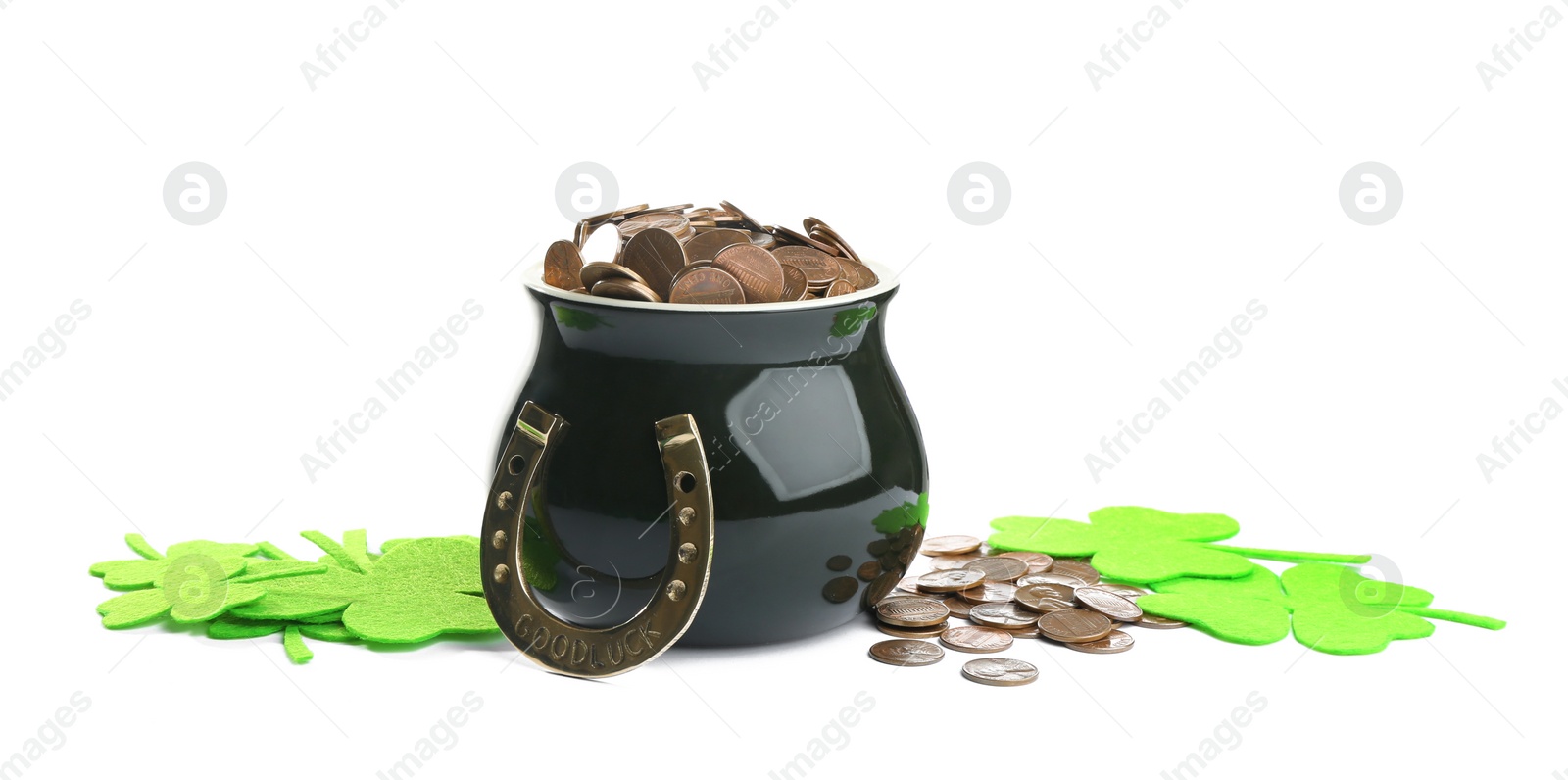 Photo of Pot of gold coins, horseshoe and clover on white background. St. Patrick's Day celebration