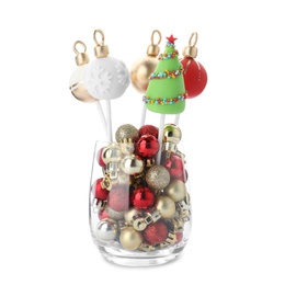Photo of Delicious Christmas themed cake pops in vase isolated on white