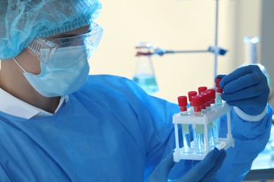 Photo of Scientist working with samples in laboratory. Medical research