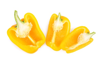 Cut yellow bell pepper isolated on white, top view