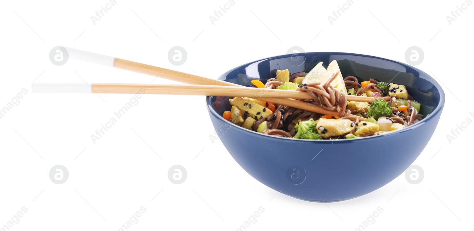 Photo of Stir-fry. Delicious cooked noodles with chicken and vegetables in bowl isolated on white