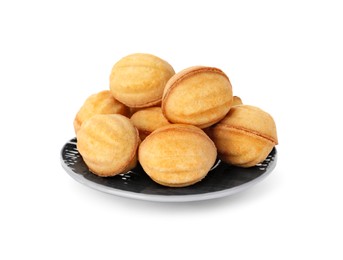 Photo of Plate of delicious nut shaped cookies with condensed milk on white background