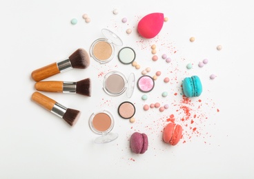 Photo of Decorative makeup products on white background