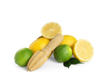 Photo of Wooden juicer, fresh lime and lemons on white background