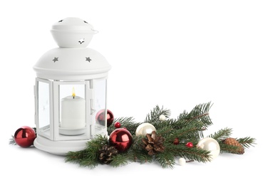 Lantern and Christmas decorations on white background