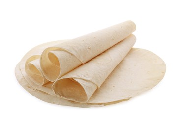 Delicious rolled Armenian lavash on white background
