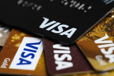 MYKOLAIV, UKRAINE - FEBRUARY 22, 2022: Visa credit cards as background, closeup