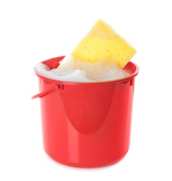 Photo of Plastic bucket with foam and sponge isolated on white. Cleaning supplies