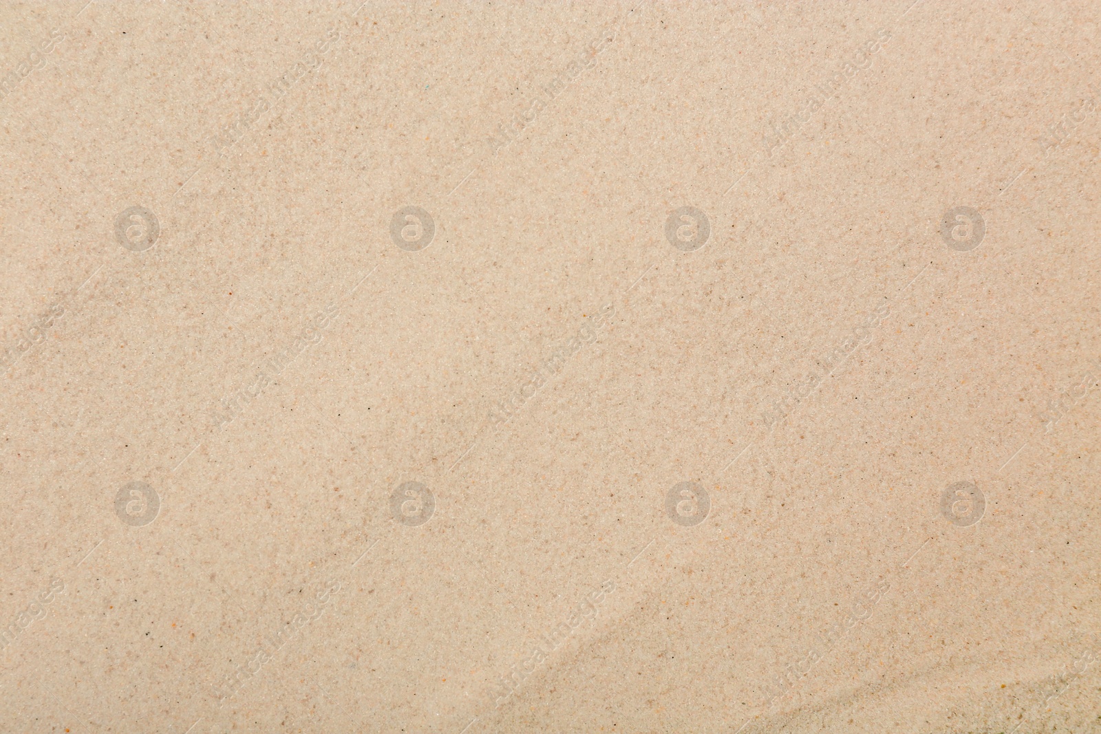 Photo of Dry beach sand as background, top view