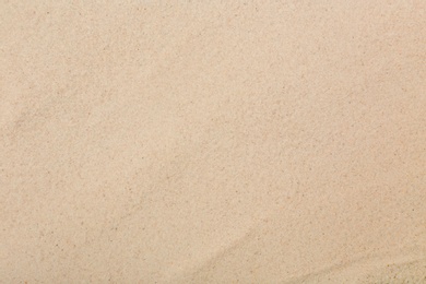 Photo of Dry beach sand as background, top view