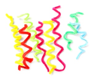 Colorful fluffy wires on white background, top view