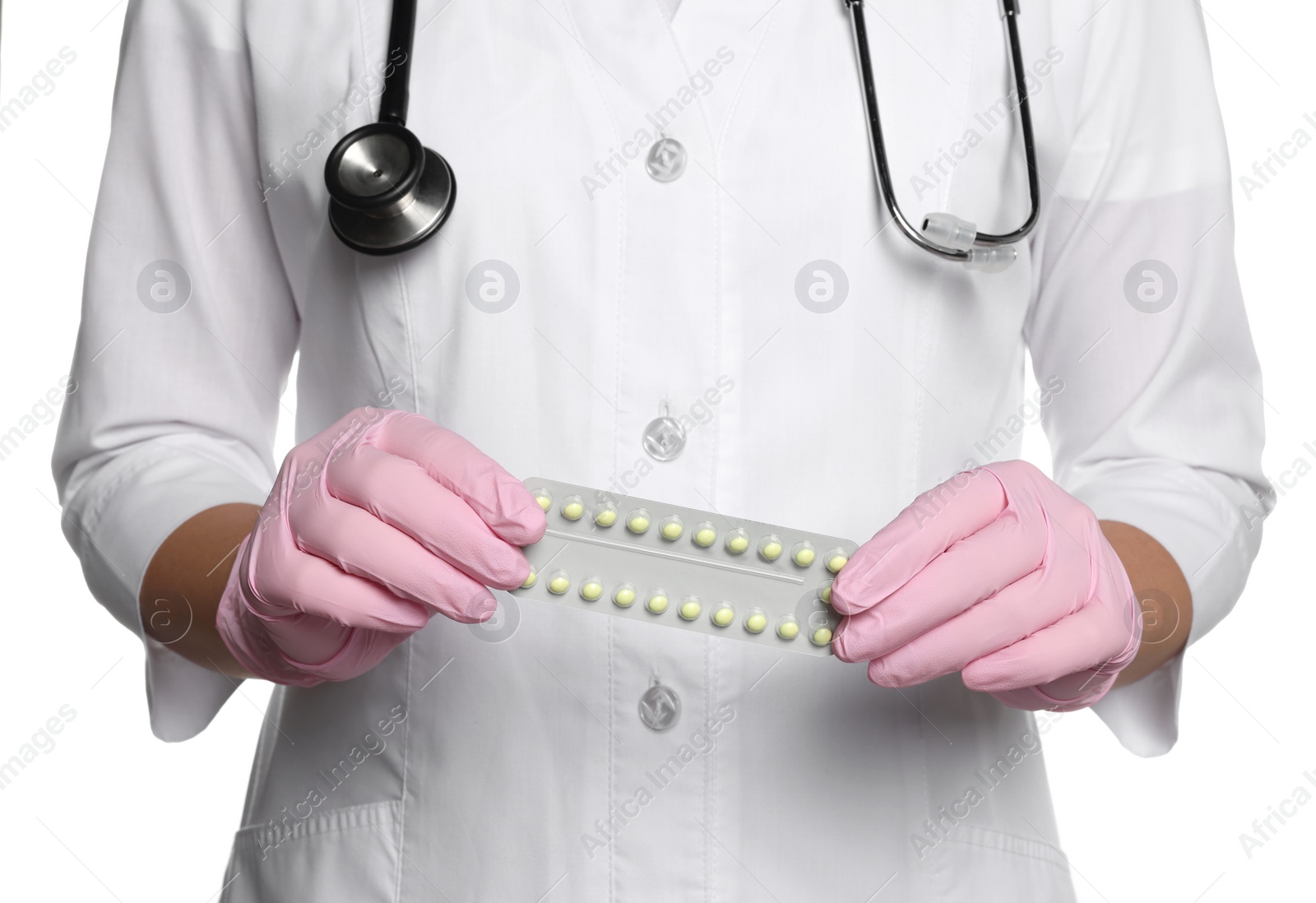 Photo of Doctor holding blister of oral contraception pills on white background, closeup