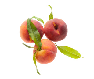 Photo of Delicious ripe juicy peaches with leaves isolated on white, top view