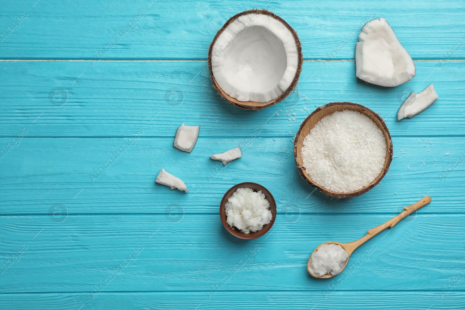 Photo of Composition with coconut oil on wooden table, top view. Healthy cooking