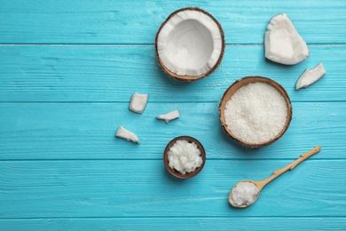 Composition with coconut oil on wooden table, top view. Healthy cooking