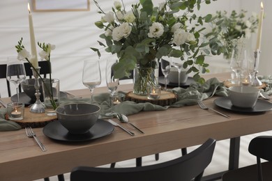 Festive table setting with beautiful tableware and decor indoors