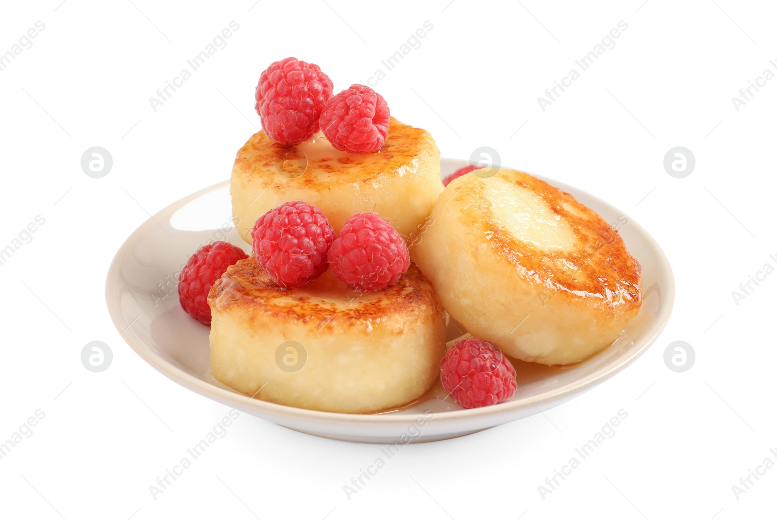 Photo of Delicious cottage cheese pancakes with raspberries on white background