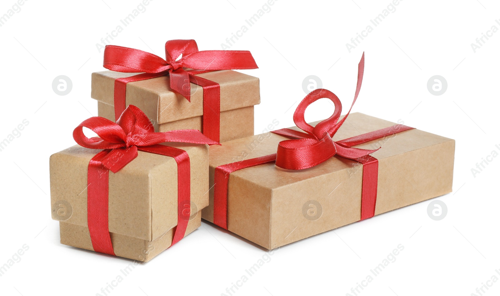 Photo of Christmas present. Many kraft gift boxes on white background