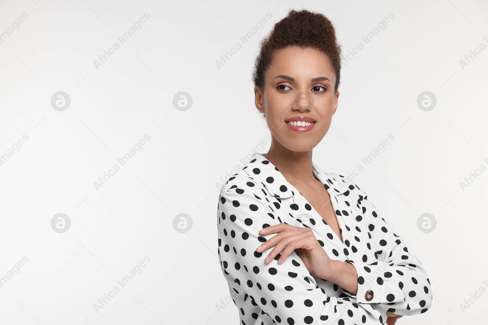 Photo of Portrait of beautiful young woman on white background. Space for text