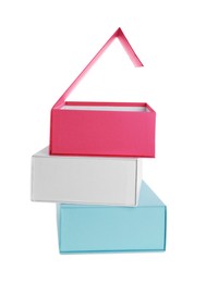 Photo of Stack of colorful shoe boxes on white background