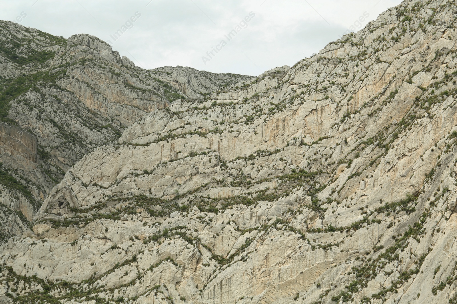 Photo of Picturesque landscape with high mountains under beautiful sky