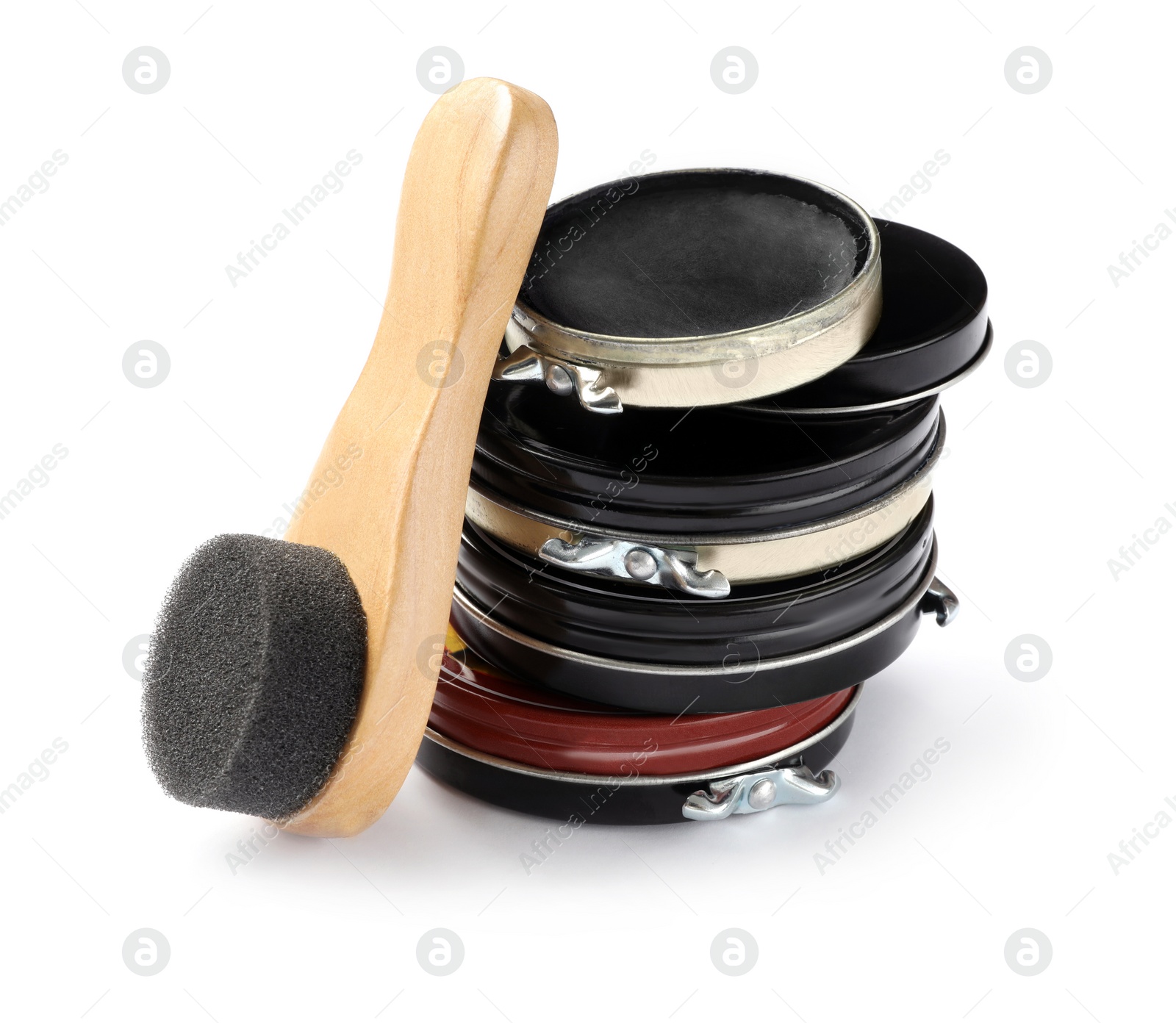 Photo of Shoe care accessories on white background. Footwear shine items