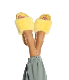 Photo of Woman in fluffy slippers on white background, closeup