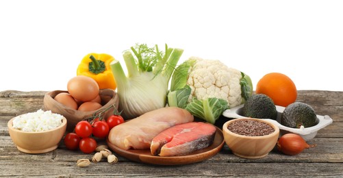 Photo of Healthy food. Different fresh products on wooden table against white background