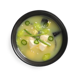 Photo of Bowl of delicious miso soup with tofu isolated on white, top view