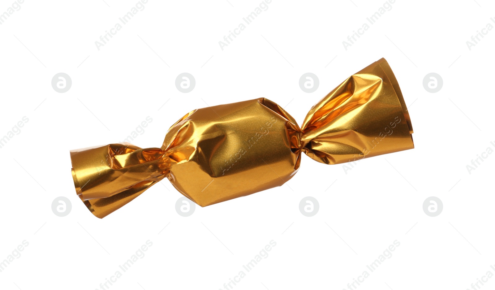 Photo of Delicious candy in golden wrapper isolated on white