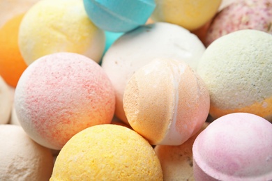 Many bath bombs as background, closeup view