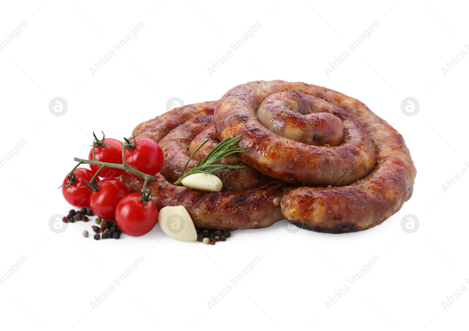 Photo of Delicious homemade sausages with spices and tomatoes isolated on white