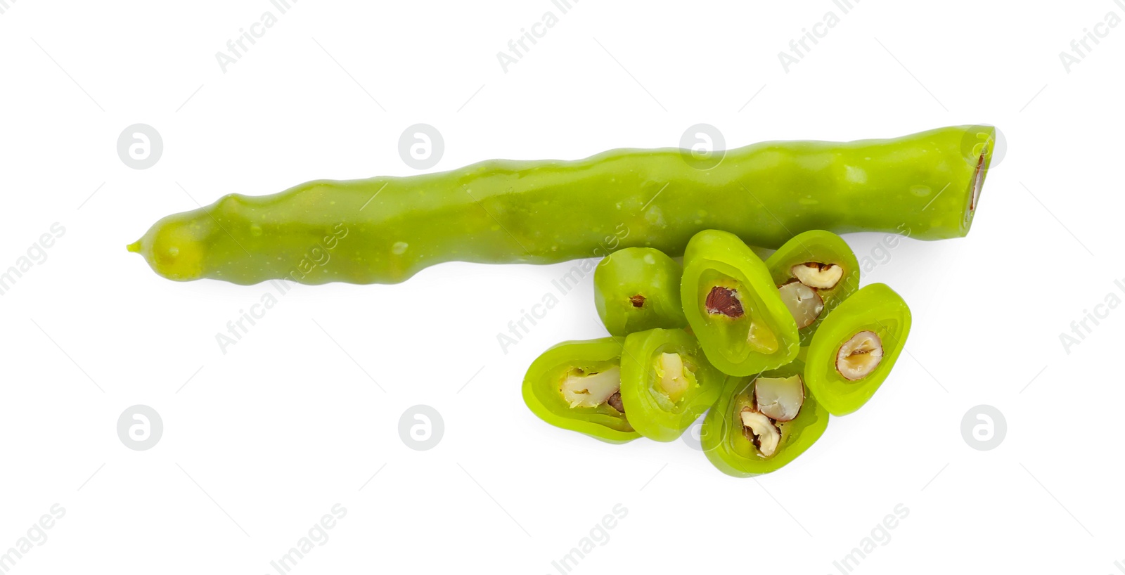 Photo of Delicious cut churchkhelas with nuts isolated on white, top view