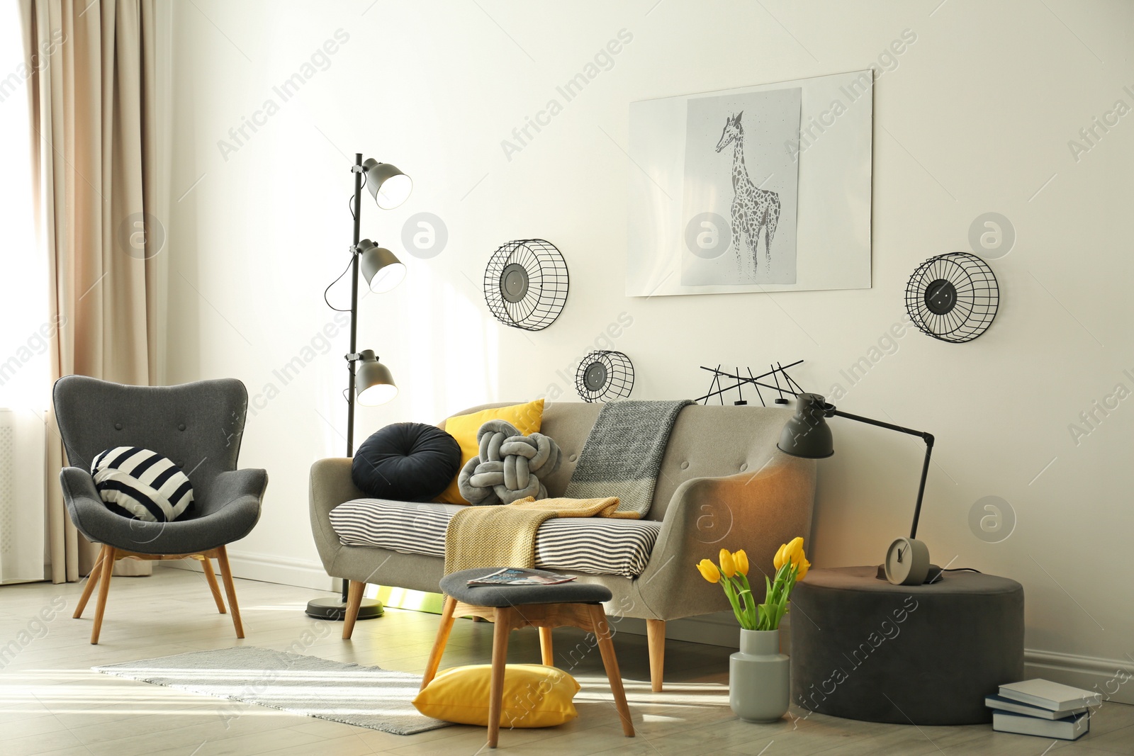 Photo of Stylish living room interior with comfortable sofa. Idea for home decor