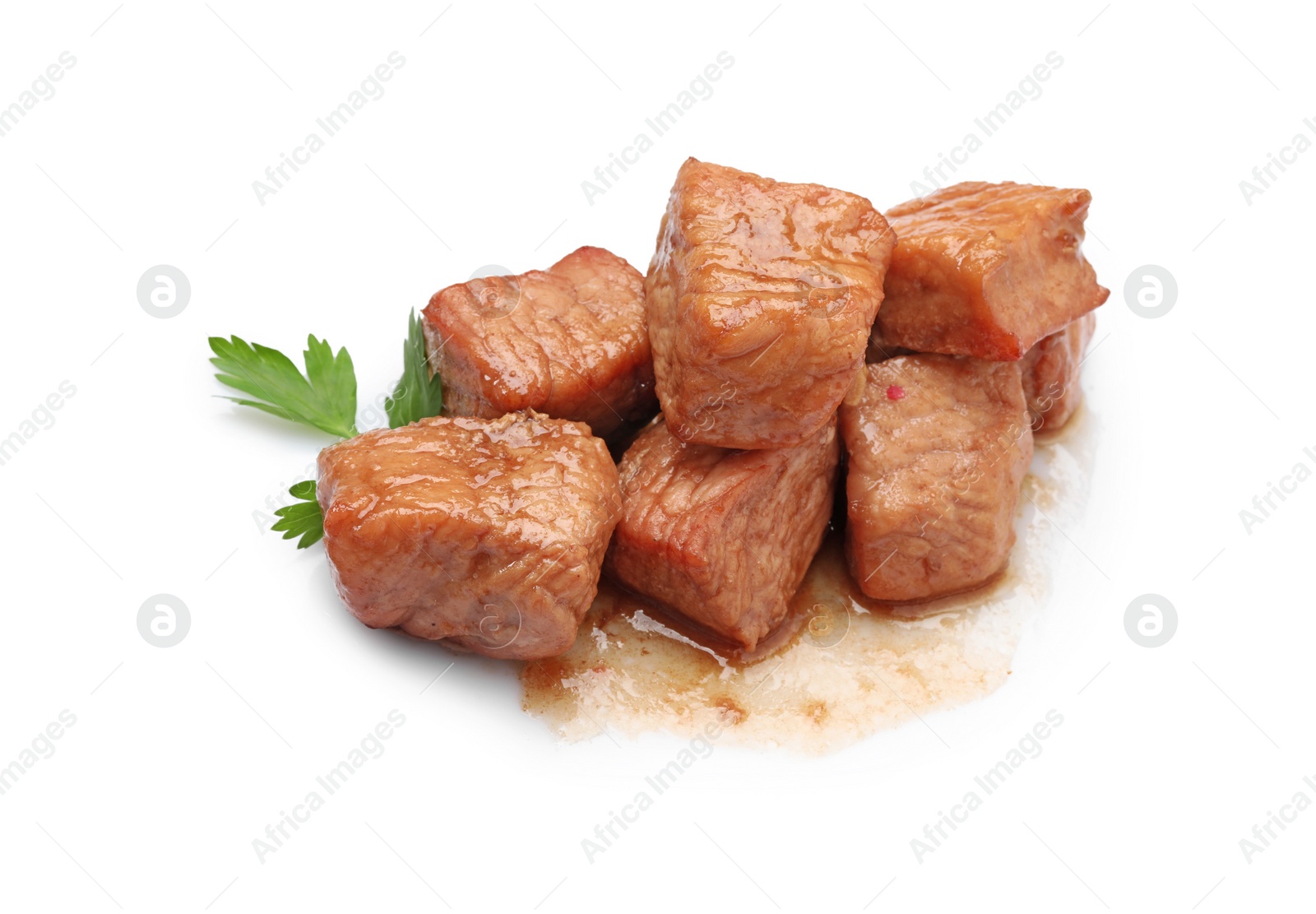 Photo of Pieces of delicious cooked beef and parsley isolated on white. Tasty goulash