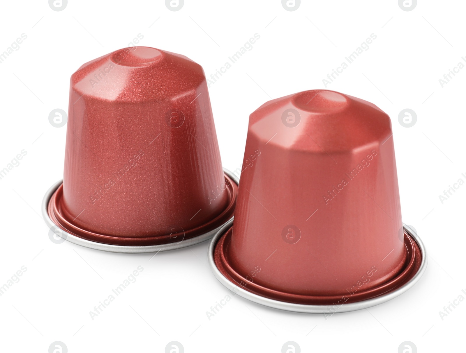 Photo of Two plastic coffee capsules isolated on white