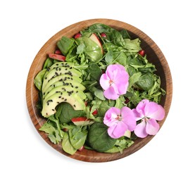 Photo of Fresh spring salad with flowers in bowl isolated on white,  top view