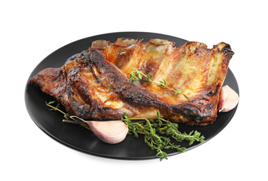 Photo of Tasty grilled ribs with thyme and garlic isolated on white