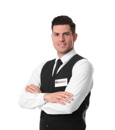 Portrait of happy receptionist in uniform on white background