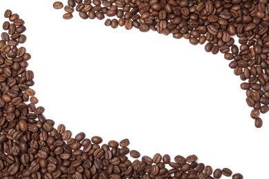 Photo of Frame of roasted coffee beans on white background, top view