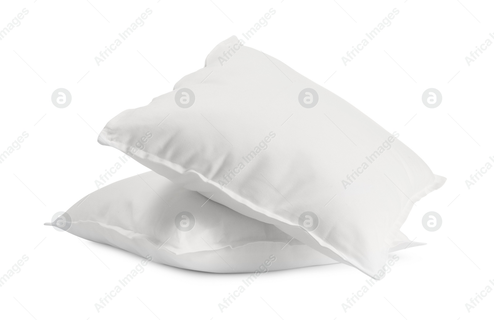 Photo of Two new soft pillows isolated on white